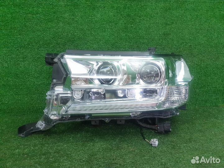 Фара левая Toyota Land Cruiser