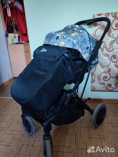 Прогулочная коляска с реверсивным блоком