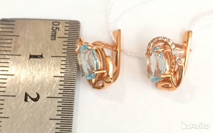 Золотые серьги с топазами (27000)**