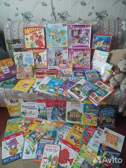 Большая коллекция книг и пазлов