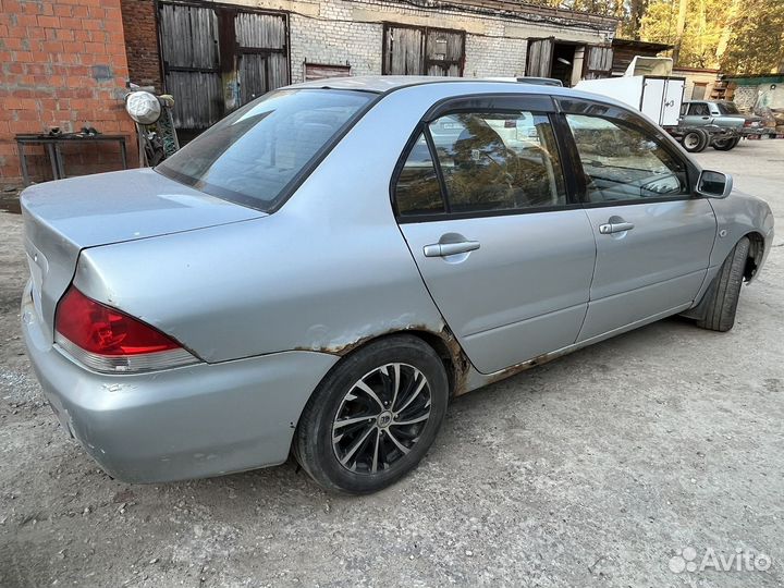 Mitsubishi Lancer 1.6 МТ, 2004, 281 500 км