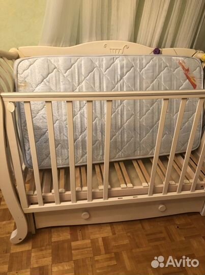 Детская кроватка с маятником Можга