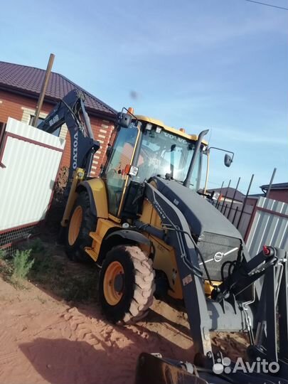 Услуги эксковатора-погрузчика