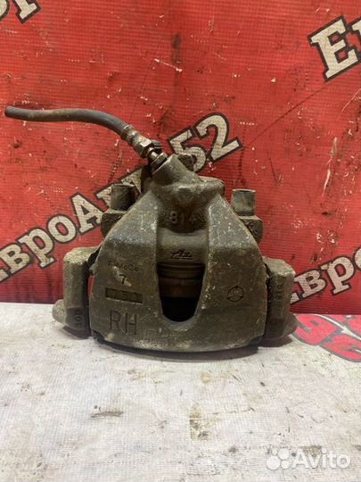 Суппорт тормозной передний правый Mazda 3 BK 2.0