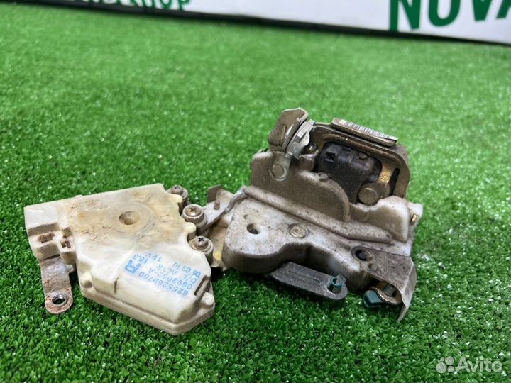 Замок боковой двери задний правый Nissan Almera