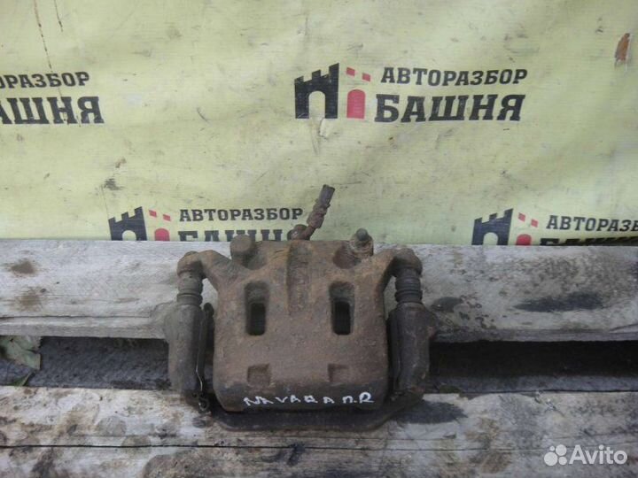 Суппорт тормозной передний правый Nissan Navara