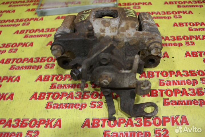 Суппорт тормозной задний правый Mitsubishi Outland