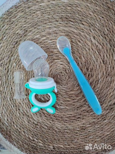 Ниблер и первая ложечка для кормления