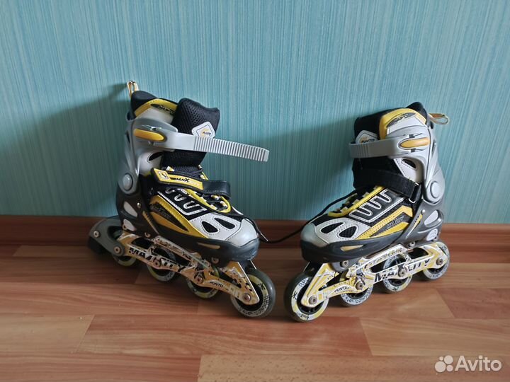 Роликовые коньки