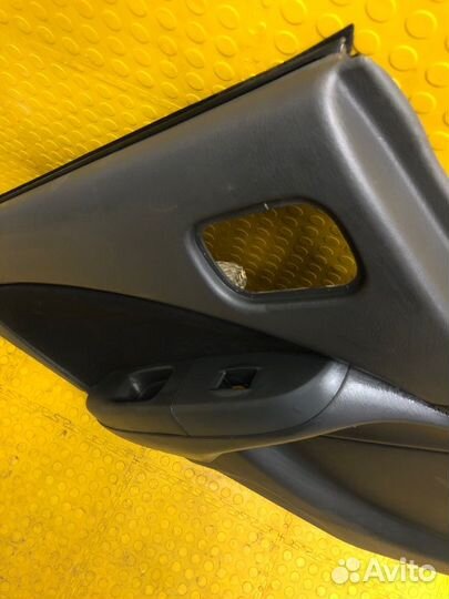 Обшивка двери задняя левая Nissan Almera Classic