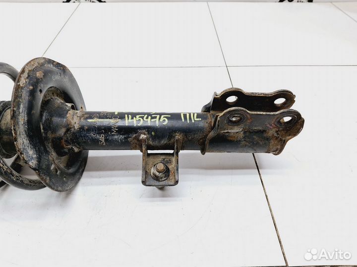 Амортизатор передний левый Kia Sportage III (SL)