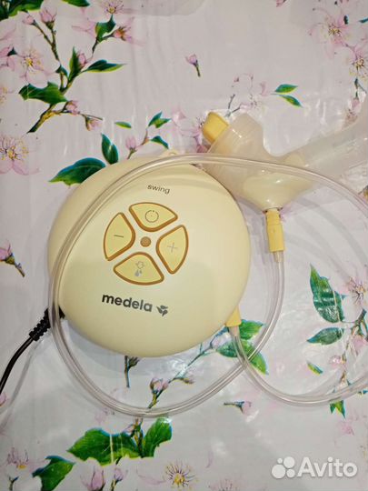 Молокоотсос medela электрический