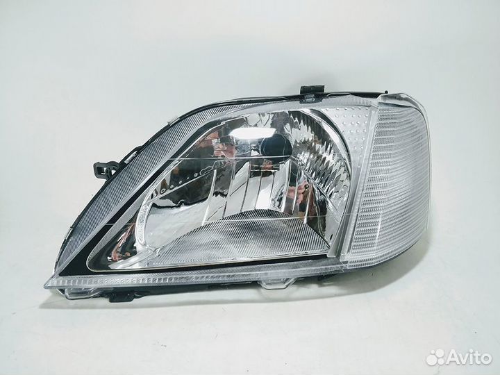 Фара левая Renault Logan 1