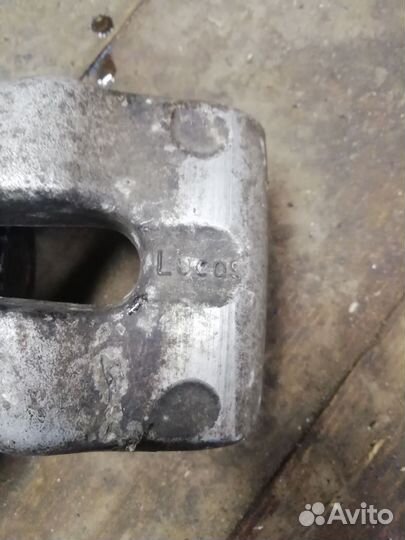 Суппорт тормозной задний левый на opel astra н