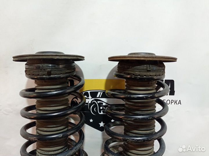 Стойки амортизаторов передние (комплект)