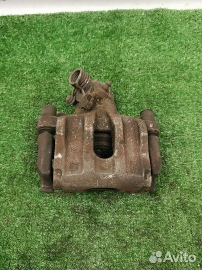 Суппорт тормозной задний левый Ford Focus 2 1.6