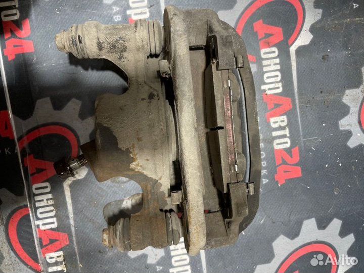 Суппорт тормозной передний правый Toyota Tercel