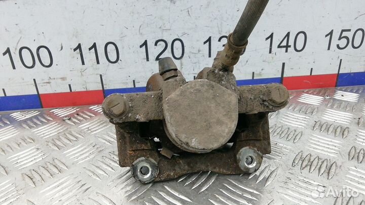 Суппорт задний левый Toyota Corolla Verso