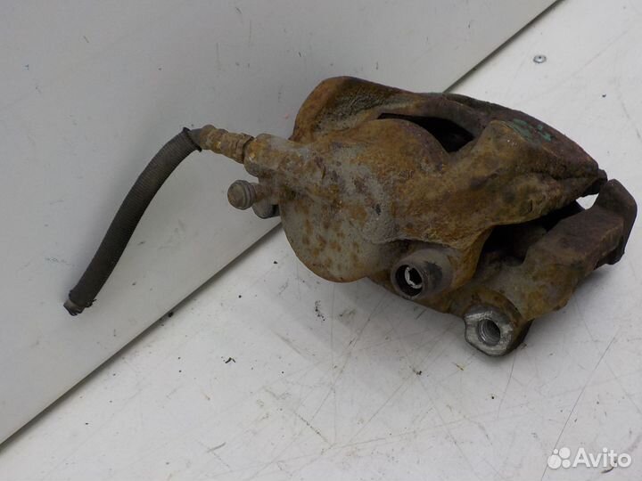 Суппорт тормозной передний левый Land Rover Freela