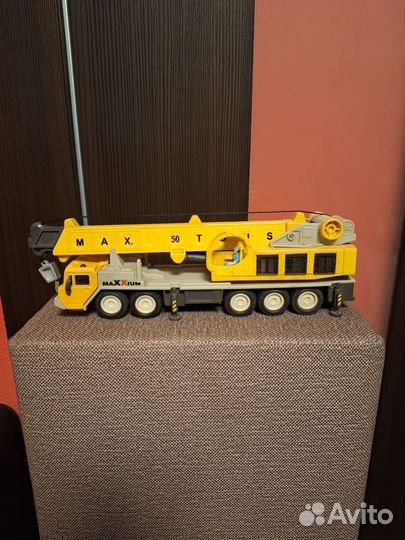 Машина кран