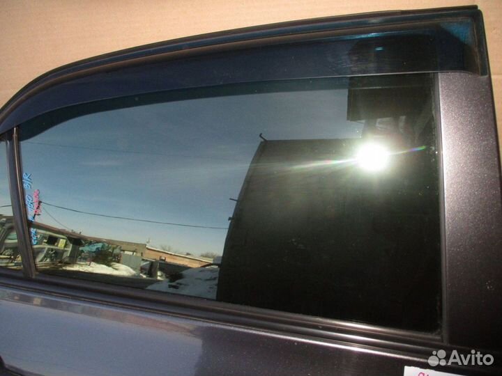 Стекло двери задней правой Toyota Corolla (E150)
