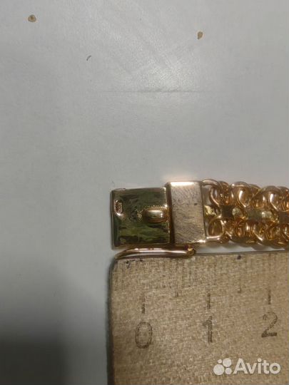 Золотой браслет восьмерка