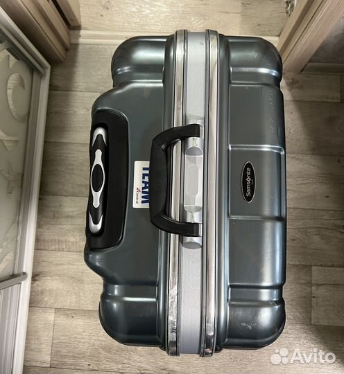 Чемодан Samsonite спинер четырёхколёсный