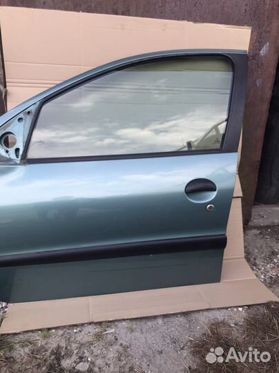 Дверь передняя левая Peugeot 206