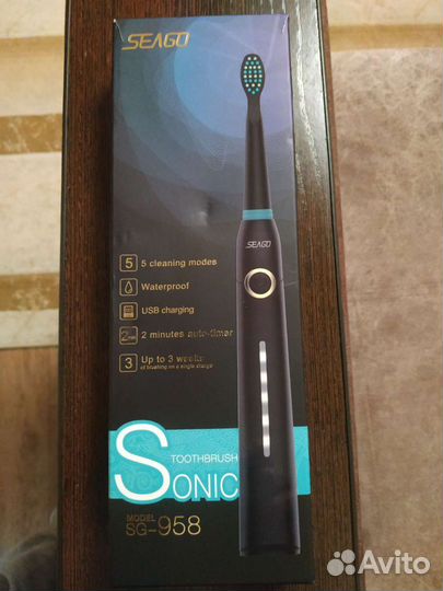 Электрическая зубная щётка новая