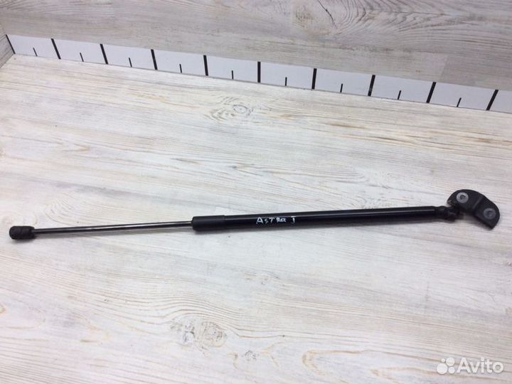 Амортизатор двери багажника правый Opel Astra J