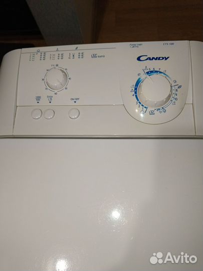 Стиральная машина Канди с вертикальной загрузкой