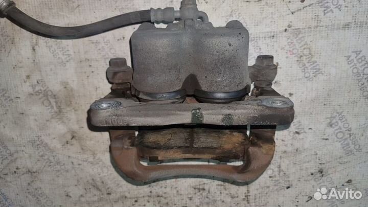 Тормозной суппорт передний Mazda cx-7 мазда