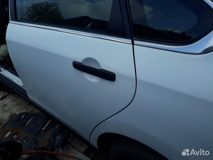 Двери задние левые almera g15