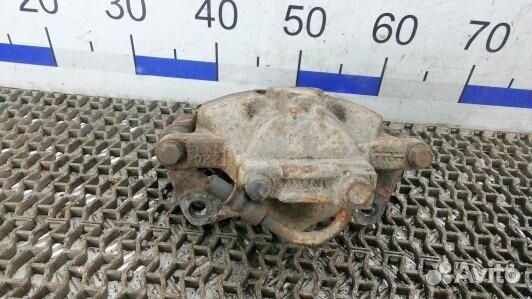 Суппорт тормозной передний левый chrysler voyager