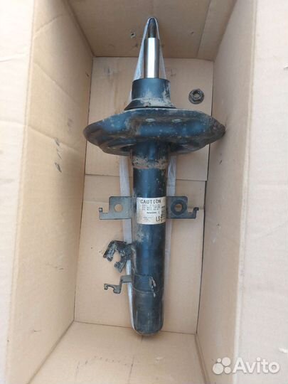 Стойка передняя левая Nissan Qashqai j11