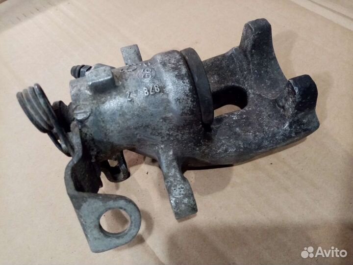 Суппорт тормозной Opel Astra/Meriva/Zafira