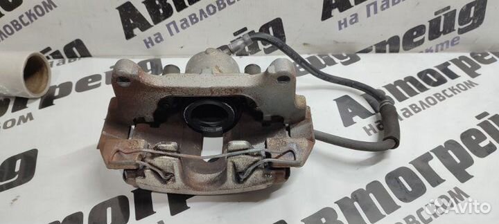 Суппорт тормозной передний правый Volkswagen