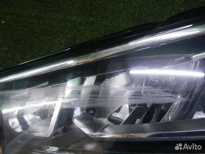 Фара левая Volkswagen Tiguan