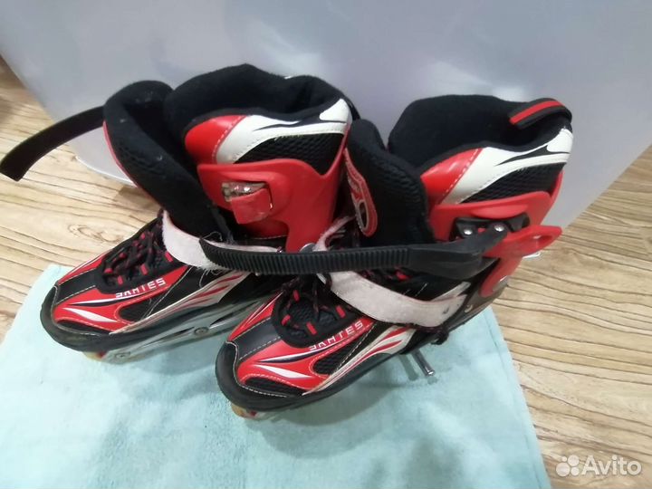 Роликовые коньки