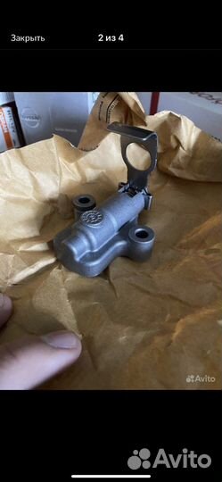 Натяжитель цепи грм Nissan 13070-EN200