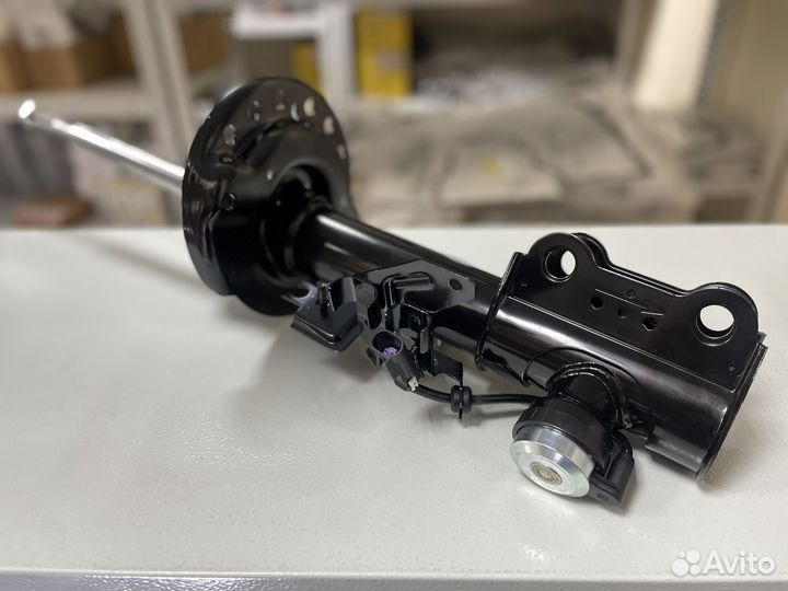 Амортизатор передний Cadillac SRX 2010-2016 Левый