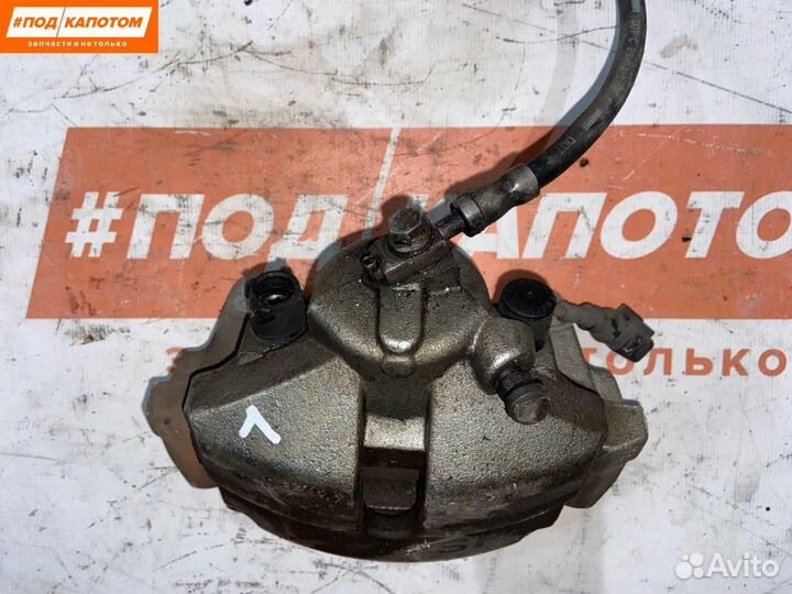 Суппорт тормозной передний левый Volkswagen Polo 5