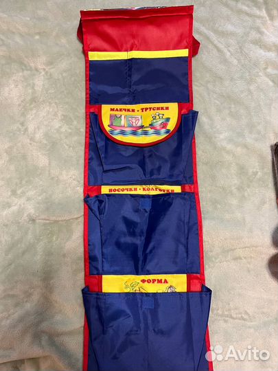 Карим: именная книга и кармашек в сад на шкафчик