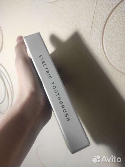Электрическая зубная щётка