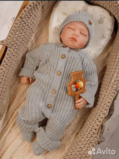 Вязаный костюм для новорожденного