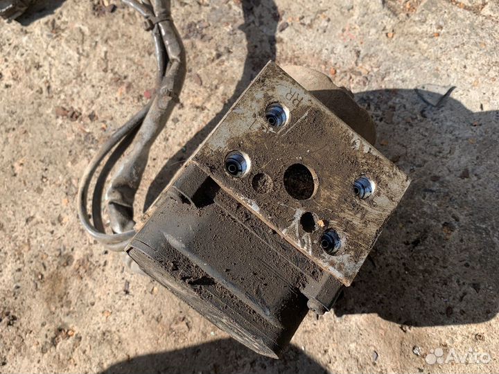 Блок (насос) ABS Nissan Almera N15