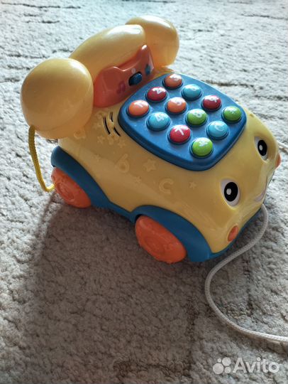 Телефон музыкальный на колёсиках