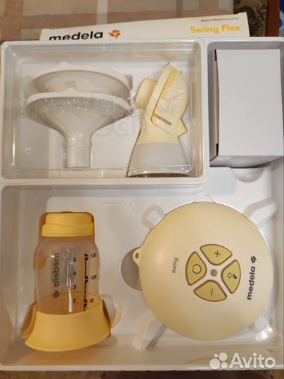 Молокоотсос medela электрический