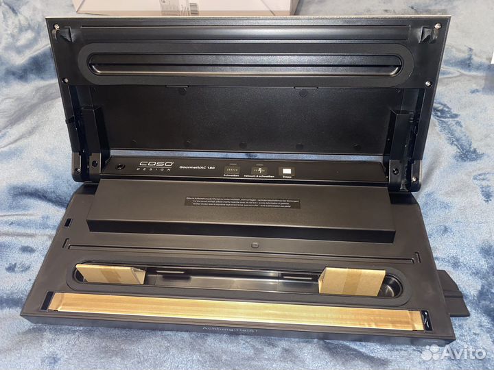 Вакуумный упаковщик