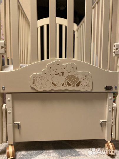 Детская кроватка Nuovita с продольным маятником